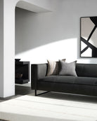 Sounding Sofa, Charcoal Leather in room